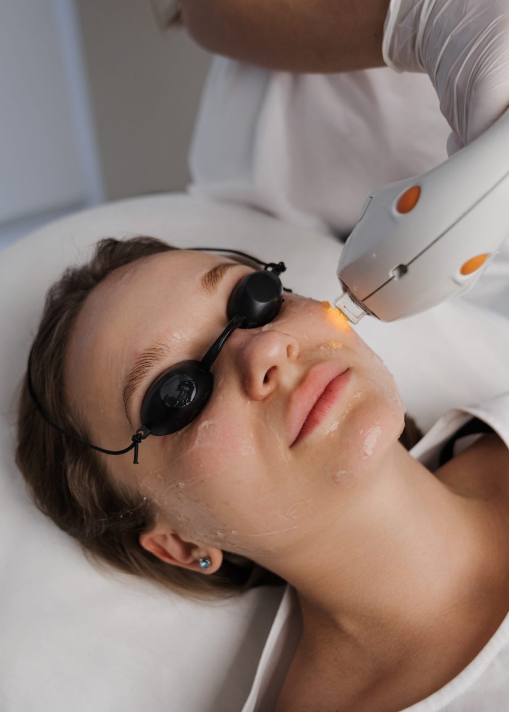Phototherapy, photorejuvenation, IPL in a beauty salon. Care for a woman's face. High quality photo